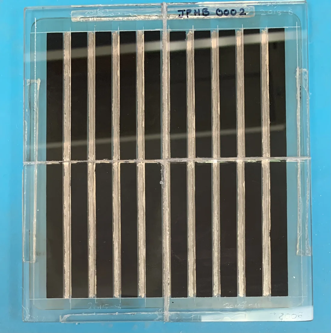 JPHB thin-glass CdTe mini-module prototype